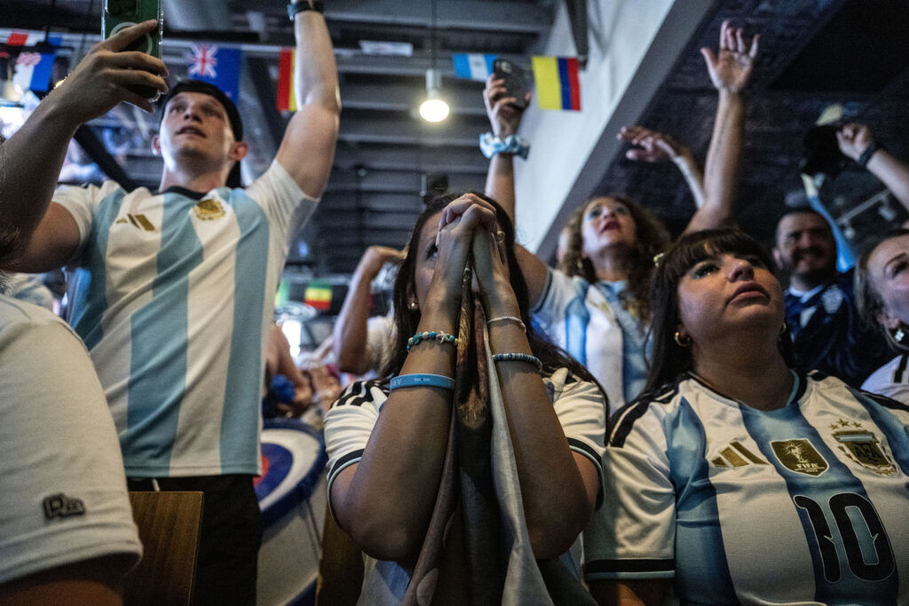 Fans nervously watch the final ten minutes during a watch party at Maria Empanada on South Broadway for the Argentina vs England World Cup semifinals on Wednesday, July 15, 2026.