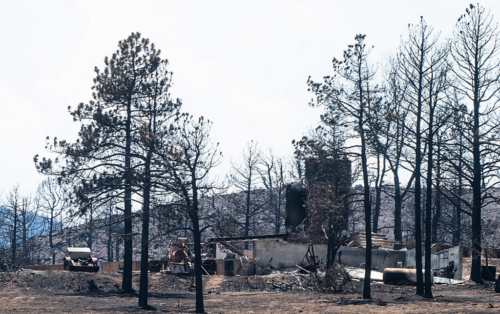 A burned structure along Northcreek Rd. in Beulah after the Aspen Acres Fire on Tuesday, July 14, 2026. (The Gazette/ Jerilee Bennett)