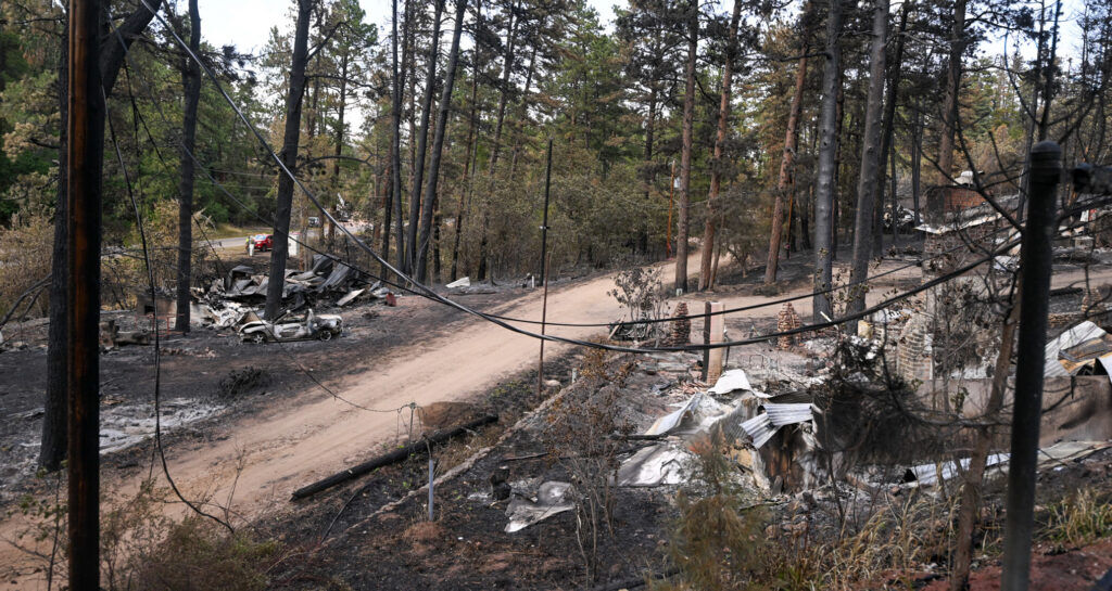 A devastated street near Pine Dr. in Beulah after the Aspen Acres Fire on Tuesday, July 14, 2026. (The Gazette/ Jerilee Bennett)