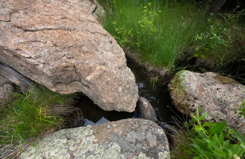 Boulders spot the creek that runs through Lost Canyon Ranch. (The Gazette, Christian Murdock)