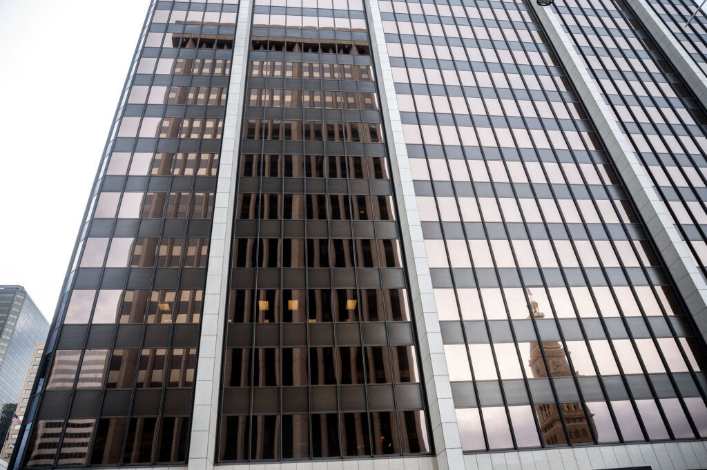 Independence Plaza, reflected in a near by building, in Denver on Wednesday, July 22, 2026.