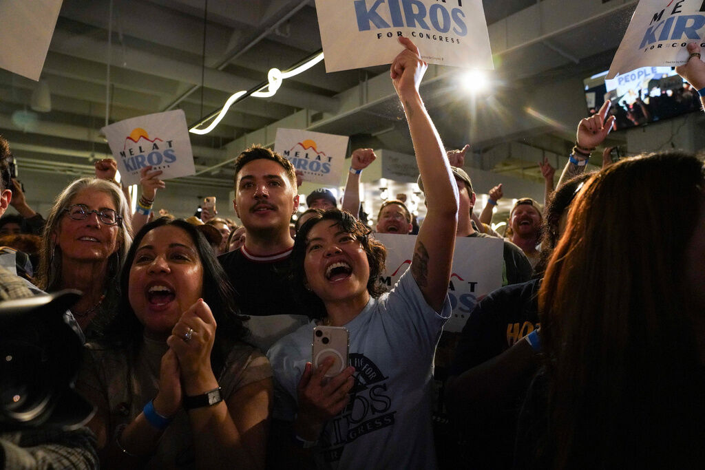 Attendees celebrate after Democratic congressional candidate Melat Kiros won the Democratic nomination during a primary election night watch party at The Broadway, Tuesday, June 30, 2026, in Denver. (AP Photo/Rebecca Slezak)