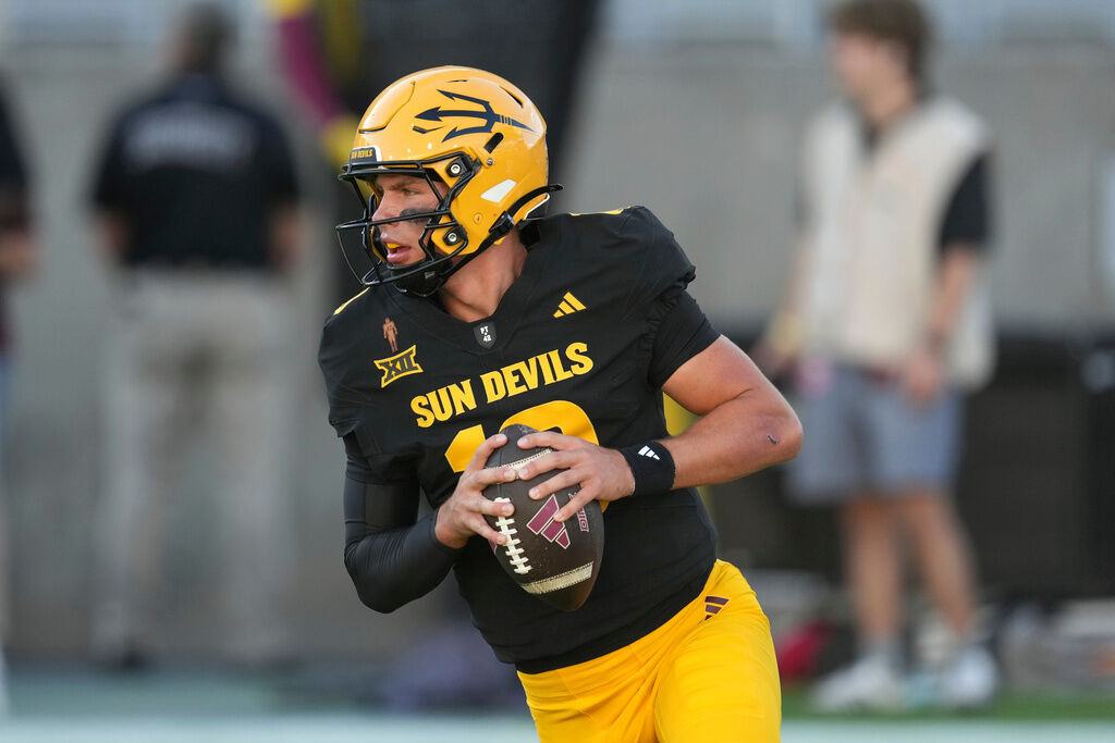 Arizona State quarterback Sam Leavitt warms up prior to an NCAA college football game against Houston Saturday, Oct. 25, 2025, in Tempe, Ariz. (AP Photo/Ross D. Franklin)