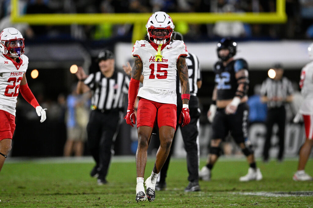 Houston defensive back Will James (15) reacts after making a tackle during the second half of an NCAA college football game against Central Florida, Friday, Nov. 7, 2025, in Orlando, Fla. (AP Photo/Phelan M. Ebenhack)