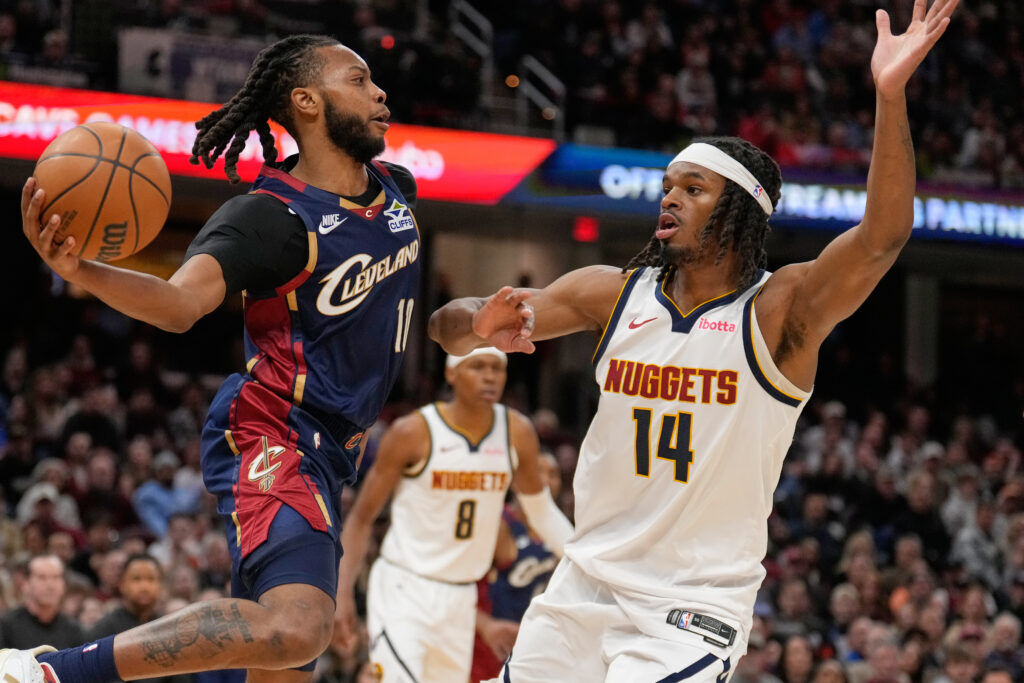 Cleveland Cavaliers guard Darius Garland and Denver Nuggets forward DaRon Holmes II