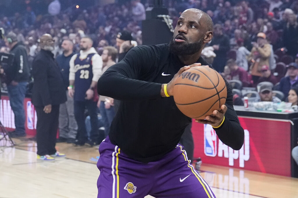 Los Angeles Lakers forward LeBron James (23) warms up before an NBA basketball game against the Cleveland Cavaliers in Cleveland, Wednesday, Jan. 28, 2026. (AP Photo/Sue Ogrocki)