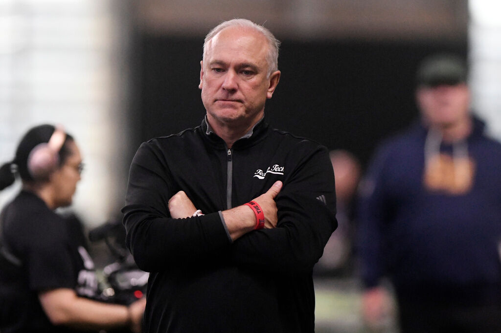 Texas Tech head coach Joey McGuire watches the broad jump during the school's NFL football pro day, Thursday, March 26, 2025, in Lubbock, Texas. (AP Photo/Annie Rice)