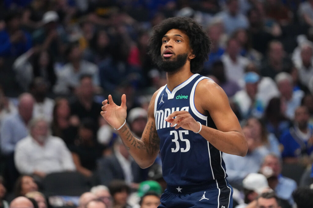 Dallas Mavericks forward Marvin Bagley III (35) looks on during the first half of an NBA basketball game between the Dallas Mavericks and the Golden State Warriors, Monday, March 23, 2026, in Dallas. (AP Photo/Julio Cortez)
