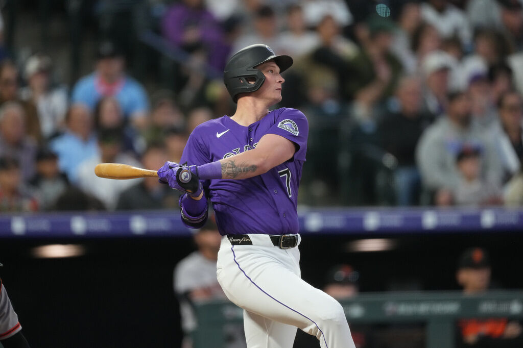 Colorado Rockies first baseman TJ Rumfield (7) in the fourth inning of a baseball game Saturday, May 30, 2026, in Denver. (AP Photo/David Zalubowski)