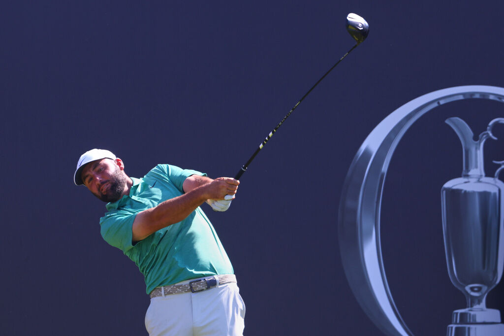 Scottie Scheffler of the United States tees off from the 1st hole during a practice round for the British Open Golf championships at Royal Birkdale golf club, in Southport, England, Tuesday, July 14, 2026. (AP Photo/Peter Morrison)