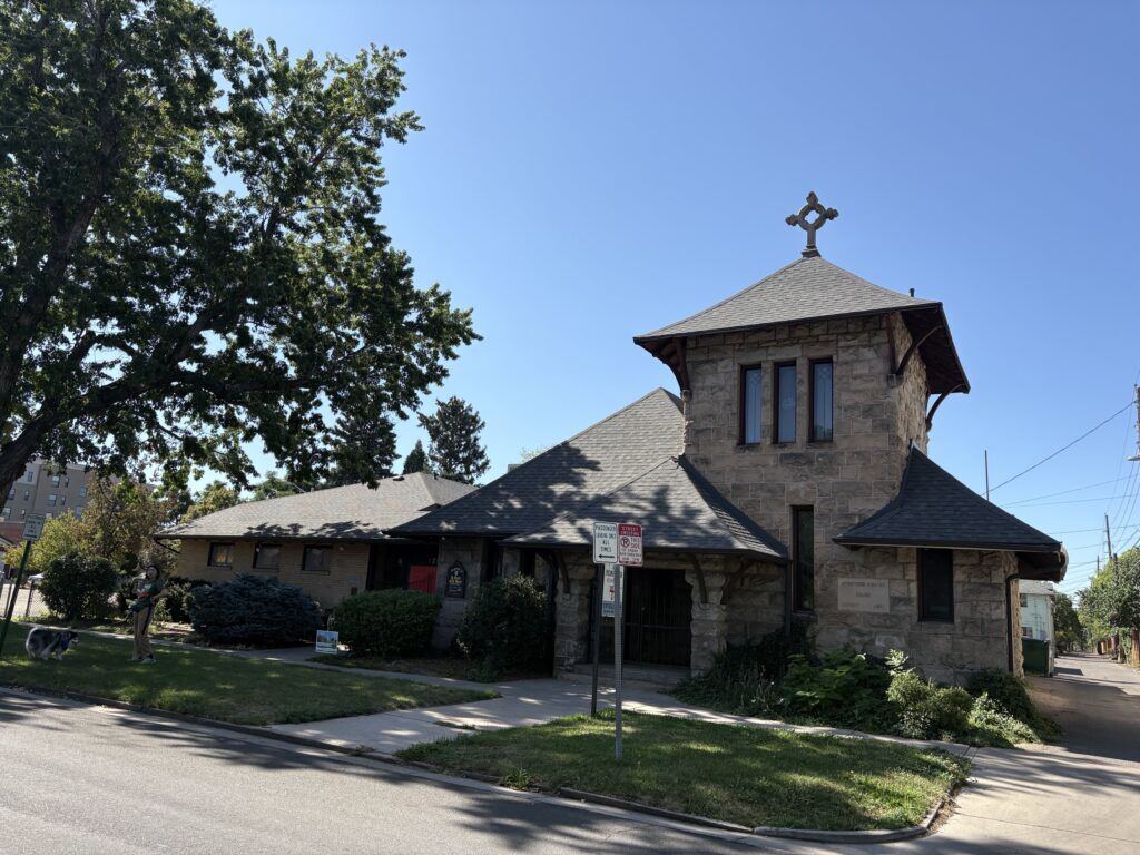 Episcopal Church of St. Peter and St. Mary, a English Cottage-style stone church in Denver's Baker neighborhood.