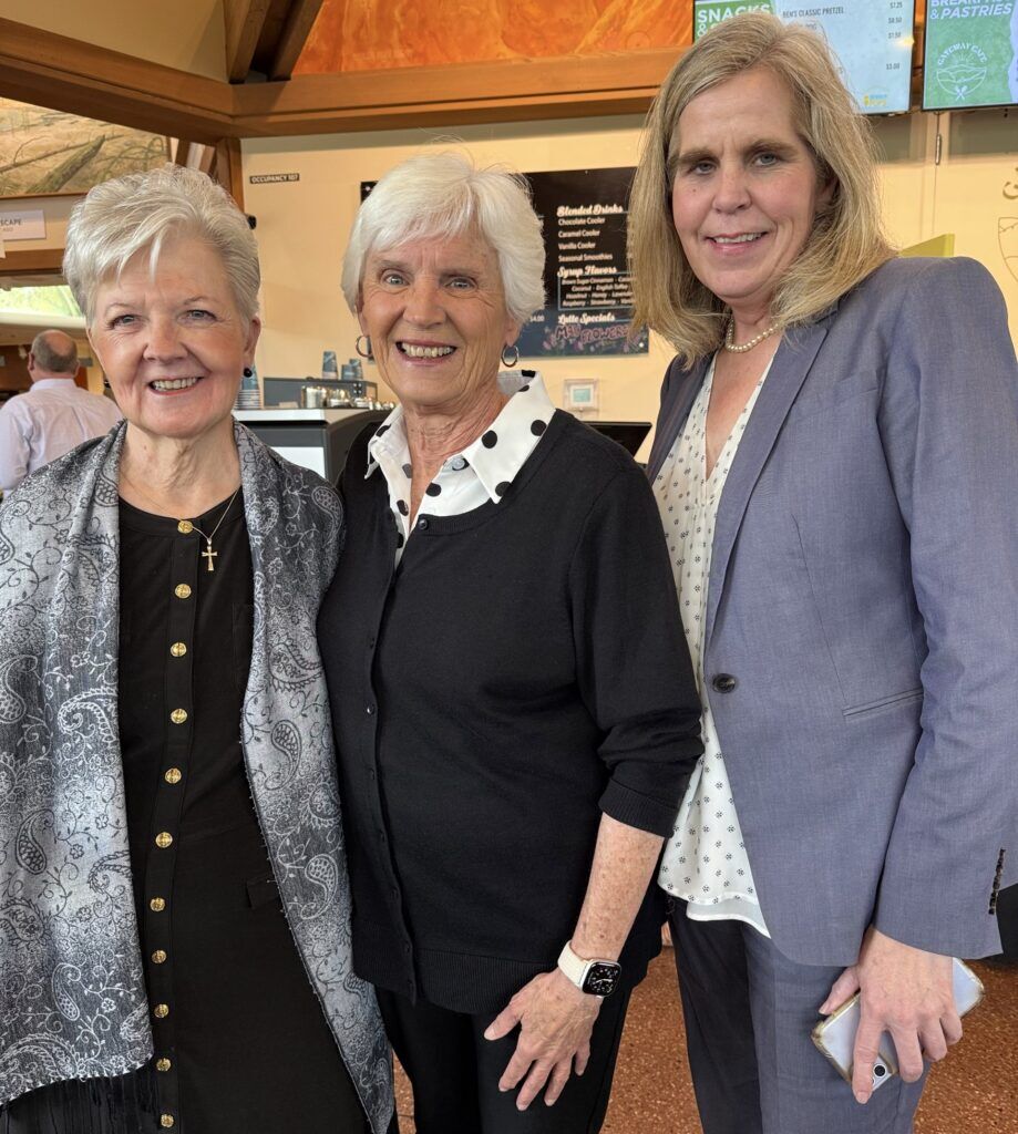 Garden of the Gods Foundation, Jan Martin, center, greets Brenda Smith and Amy Giblin from Garden of the Gods Resort. Linda Navarro, The Gazette