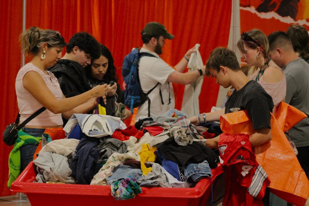 Attendees sift through vintage clothing at Thrift Con in Denver on Sunday, July 12, 2026.
(The Denver Gazette/Matt Kyle)