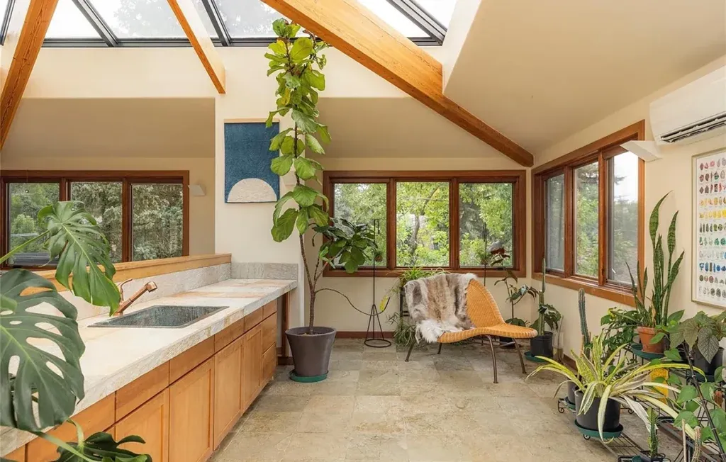 A garden-like solarium overlooks the primary suite.