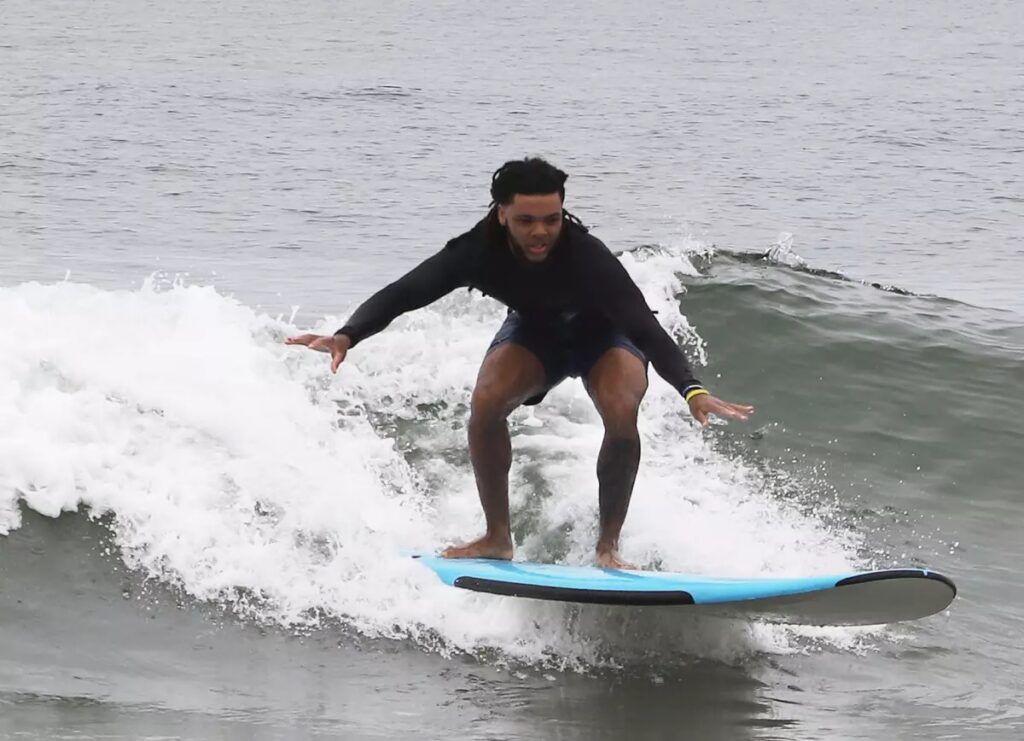 Red Murdock surfing