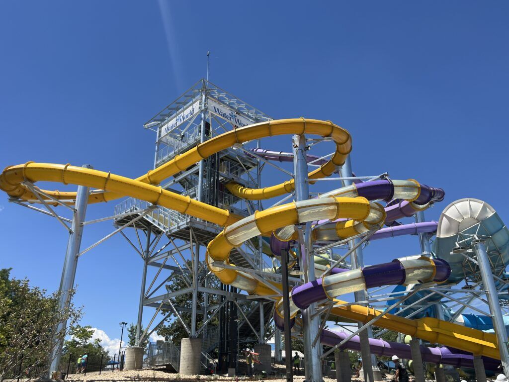 The new "Lookout Tower" at Summit Canyon in Water World features four new slides. Two body flume style slides, one of which is a drop capsule slide, and the world's first HIVE slide featuring 360 degree helixes. (Photo courtesy of Hyland Hills)