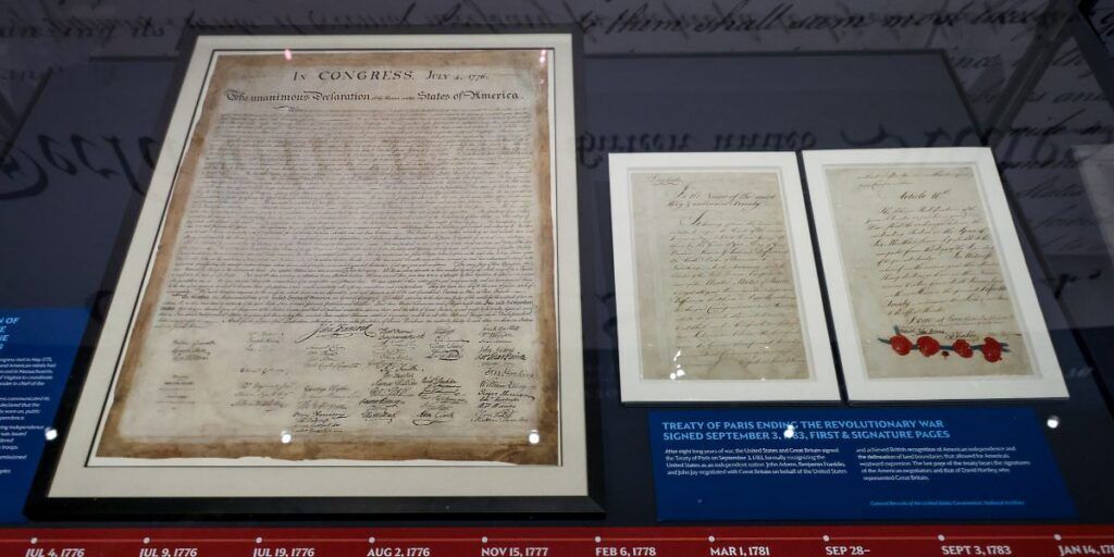 One of the original copies of the Declaration of Independence alongside the Treaty of Paris that ended the Revolutionary War at History Colorado Center exhibit. (Photo courtesy of History Colorado).