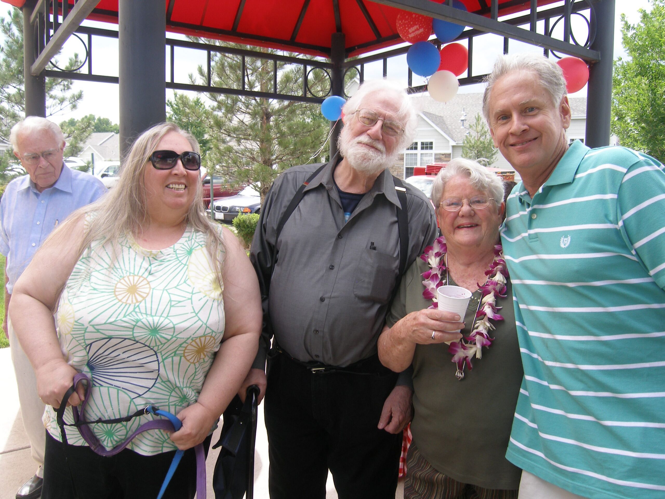 Bev Newcomb-Madden with, from left, Deb Lowenstein, Henry Lowenstein and her husband, Rick Madden, in 2005. (John Moore, The Denver Gazette)